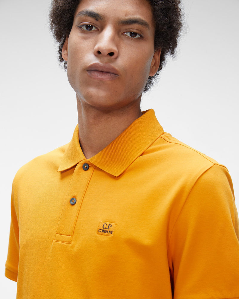 
            
                Load image into Gallery viewer, CP Company Logo Badge Polo T-Shirt
            
        
